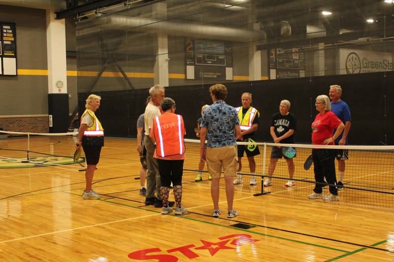 New players gathered at the net at the Fieldhouse