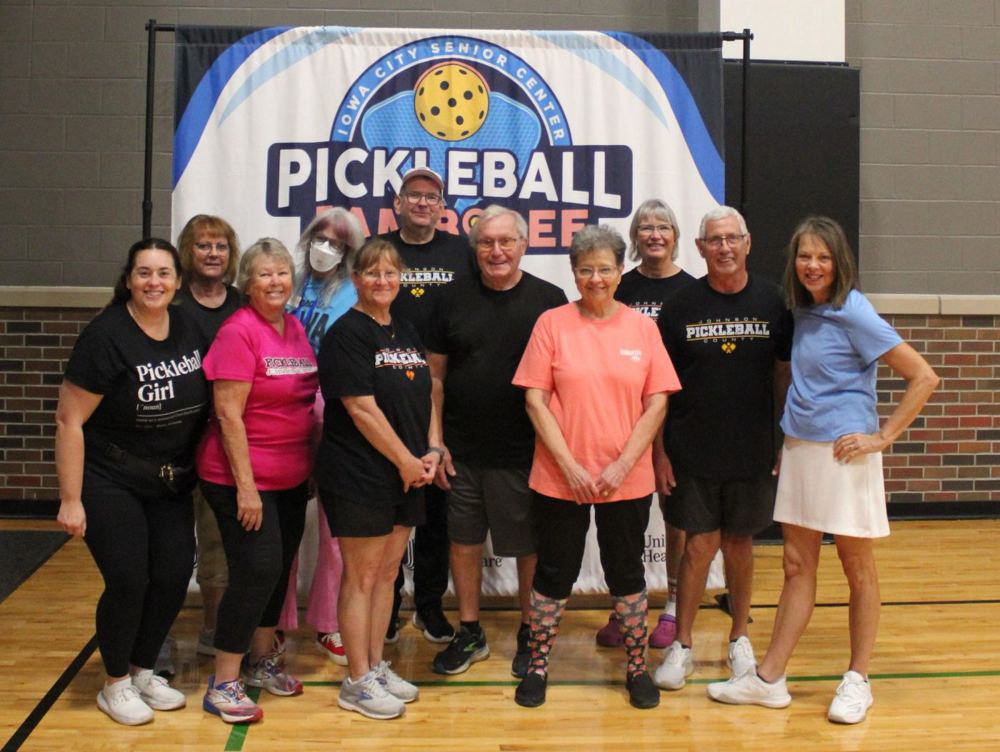 A big group of smiling members at the Pickleball Jamboree